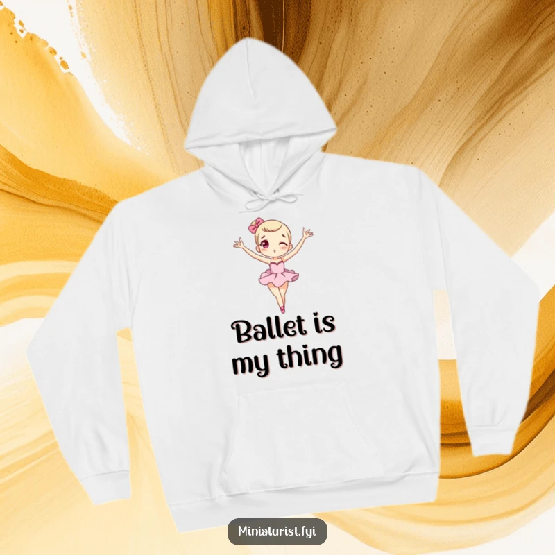 Funny miniature macaron hoodie showing a tiny character in an exaggerated ballet pose, cozy and cute.