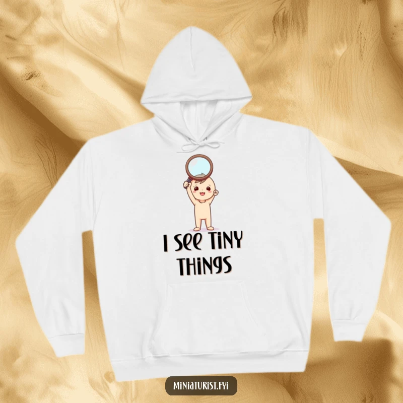 Funny Investigator Hoodie: Tiny triumphant figure holding a comically large magnifying glass, celebrating a brilliant discovery.