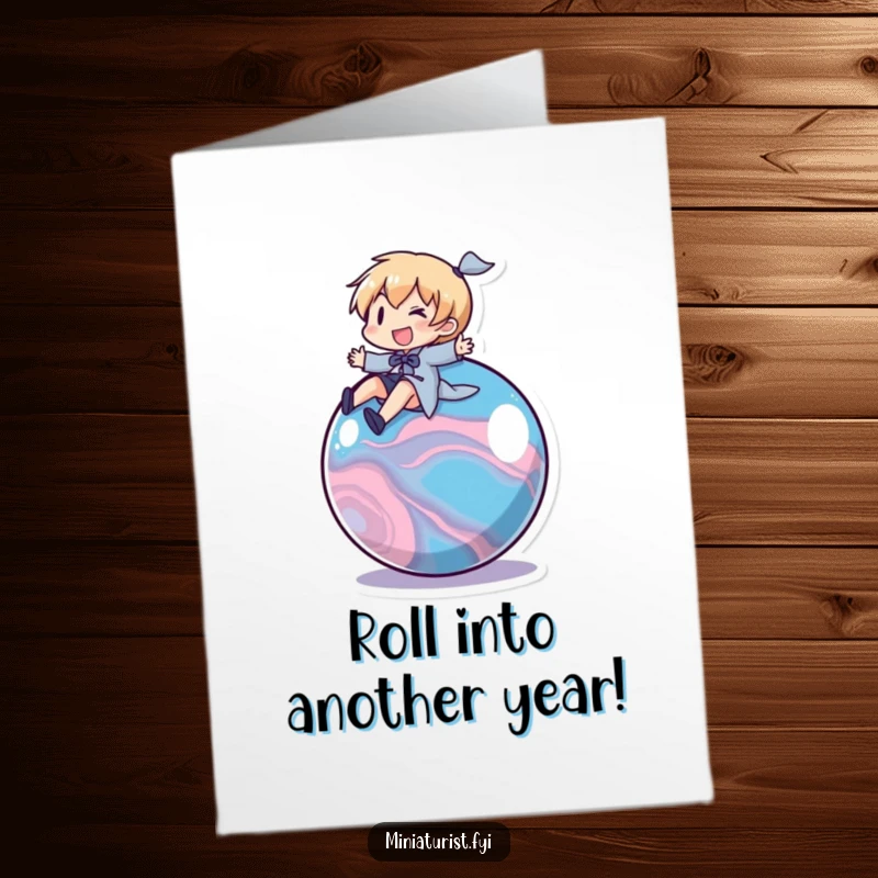 Funny Free Printable Birthday Card: Small Character Gleefully Riding a Large Rolling Marble, Embarking on a Joyful Adventure.